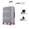 Large check-in suitcase with 8 wheels, grey shell and upright handle