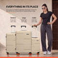 HRX Zanzibar hard-shell luggage set with stacked cases in beige, medium and large sizes