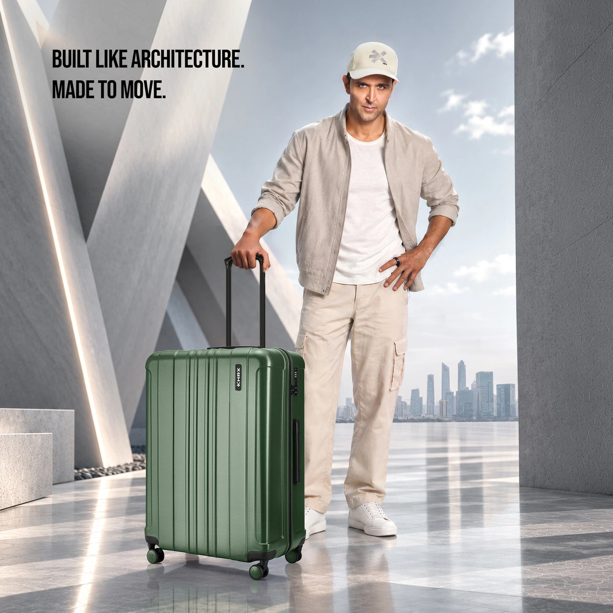 Dark green hard-shell spinner trolley suitcase with vertical ridges and 4 caster wheels.