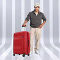 Red hard-shell spinner suitcase with telescopic handle and 4 wheels, upright