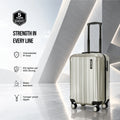Light silver cabin polycarbonate suitcase with 8 wheels and tamper-proof zipper
