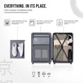Open white cabin suitcase interior with mesh pockets, divider panels, and cross straps