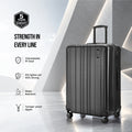 Hard shell large suitcase with telescopic handle and 8 spinner wheels; black colorway.
