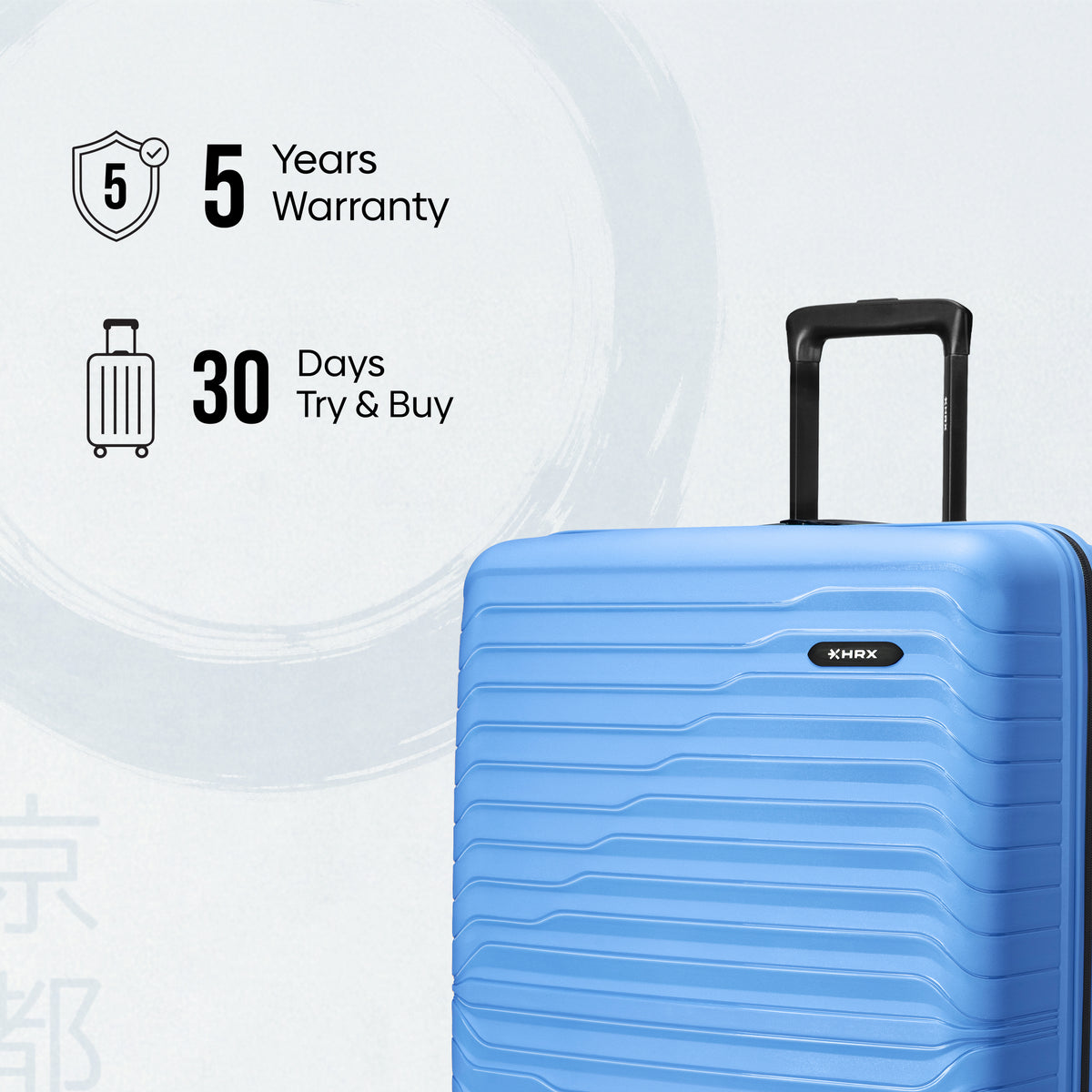 Small hard-shell carry-on suitcase, blue polypropylene, ridged design and telescopic handle