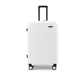 White hard-shell luggage with top handle and ridged surface, spinner wheels