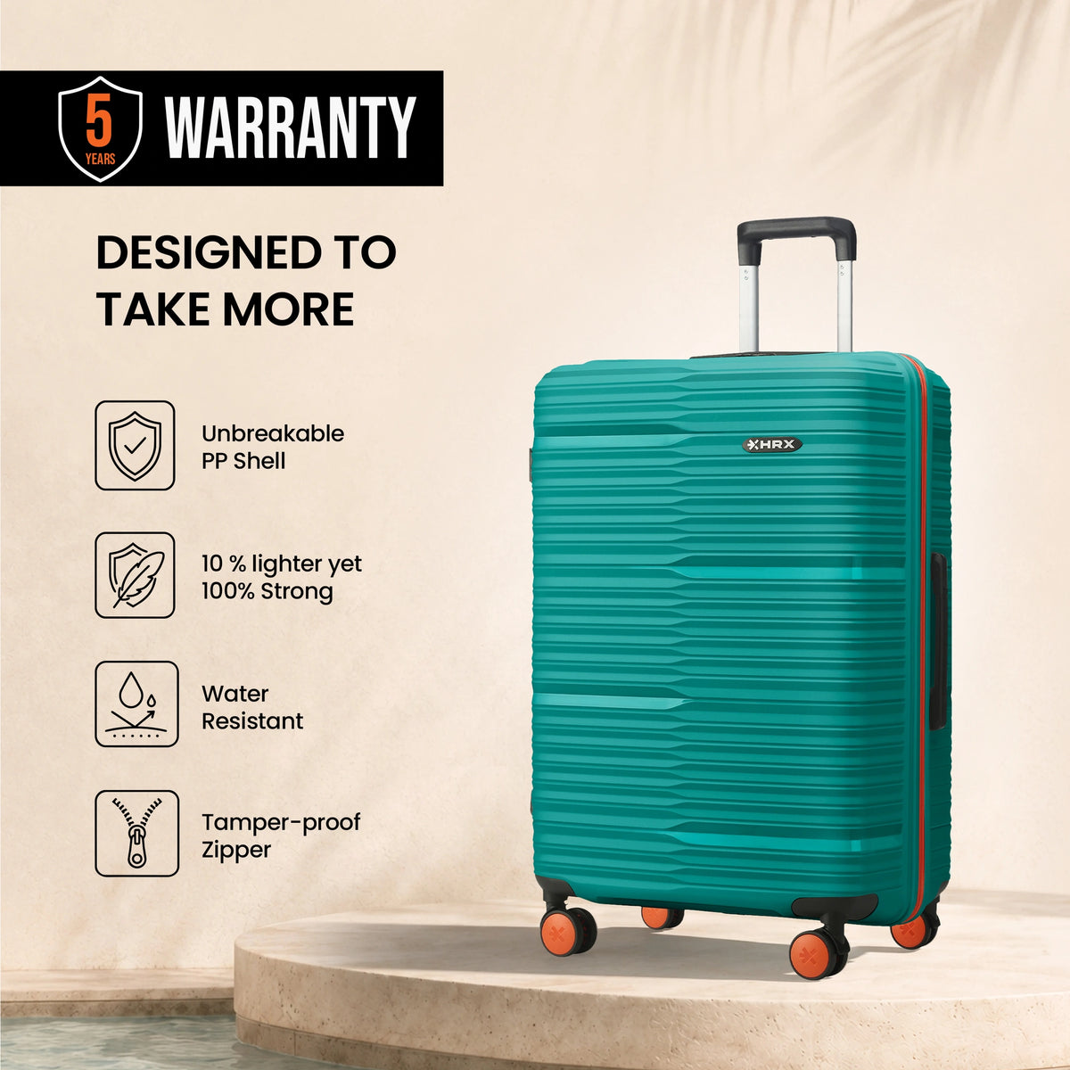Teal HRX check-in suitcase side view with 8 wheels and upright handle