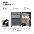 Open light silver suitcase interior with divider, free shoe bag, and compression straps