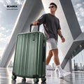 Dark green check-in suitcase rolling with top handle and four spinner wheels