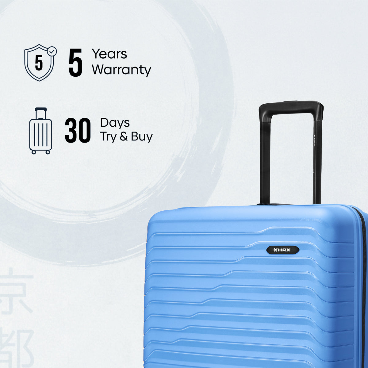 Medium check-in suitcase in blue with telescopic handle and ridged shell