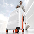 White medium check-in suitcase being pulled on 8 wheels with telescopic handle and orange accents