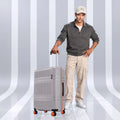 Medium polycarbonate check-in suitcase with telescopic handle, 8 wheels, grey finish, orange trim
