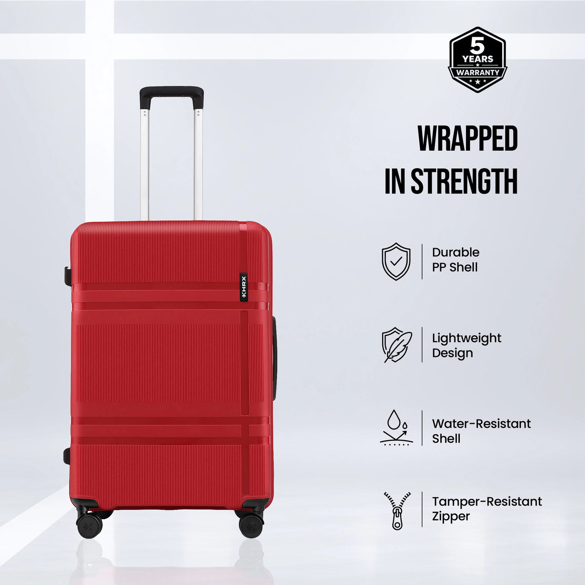 Medium red hard-shell suitcase with upright handle, 8 wheels, and side grip panel