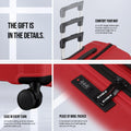 Red suitcase detail with smooth-rolling spinner wheels and built-in lock panel