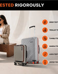Grey hard-shell medium spinner suitcase with front pocket and telescopic handle