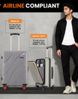 Grey medium hard-shell spinner suitcase with upright telescopic handle and red wheels