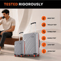 Two grey hard-shell rolling suitcases with telescopic handles and red-accent wheels