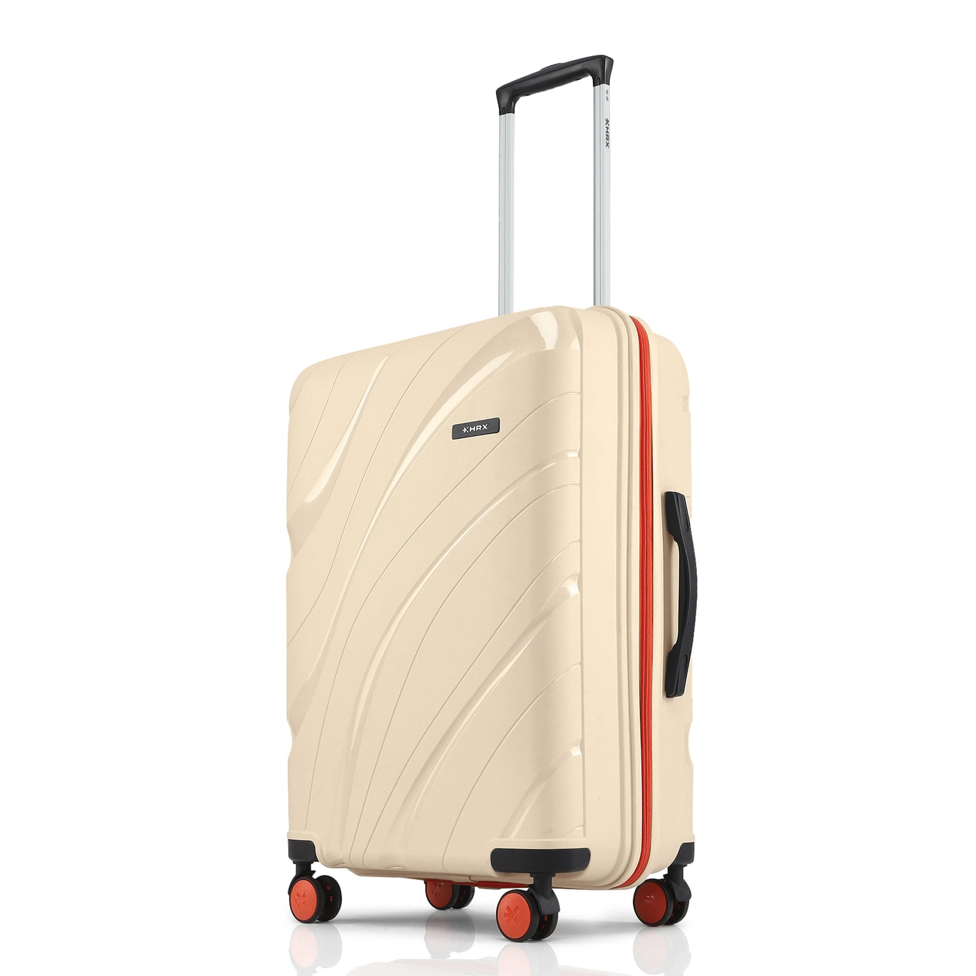 Cream medium check-in suitcase with curved shell, orange trim, and four spinner wheels.