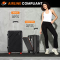 Medium black hard-shell trolley suitcase with red wheels and telescopic handle beside model