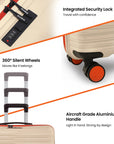 Beige small cabin suitcase close-up of aluminum handle and orange silent spinner wheels