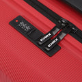 Red small cabin suitcase detail: zipper track with strap and interior lock panel