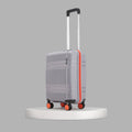 Small cabin suitcase on 8 wheels, gray hard shell with red vertical trim