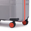 Hard-shell suitcase with 8 wheels, red side trim, dark wheel caps