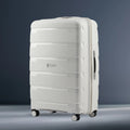 Light grey large check-in trolley suitcase, ribbed panels, four spinner wheels