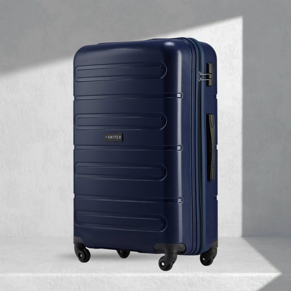 Dark blue polypropylene check-in trolley with 4 wheels, upright front view, side handle