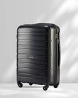 Black polypropylene check-in trolley with 4 wheels and side handle, ridged shell