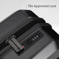 Hard-shell suitcase lock panel on exterior with recessed combination dial and zipper track