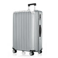 Large silver hard-shell suitcase with telescopic handle and side grip handle