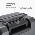 Dark gray suitcase top handle with comfort-grip grip and textured handle detail