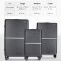 Hard-shell wheeled suitcases stacked, dark shells with silver stripe and corner wheels.