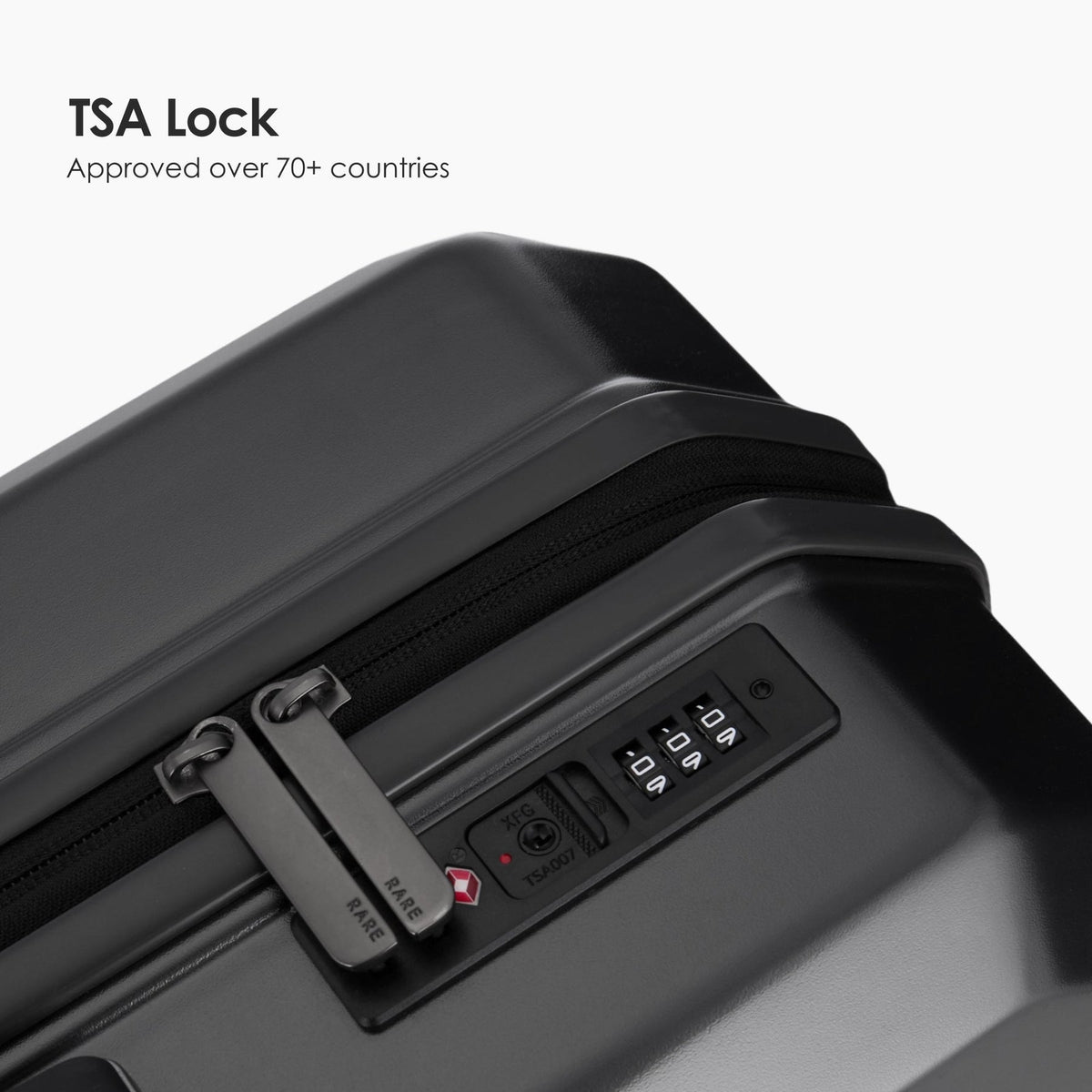 Dark suitcase with TSA lock combination keypad and lock access panel