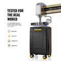 Black cabin trolley suitcase with extended handle and yellow edge accents, 8 spinner wheels.