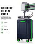 Dark cabin trolley suitcase with green wheel accents and upright handle, 8 spinner wheels.
