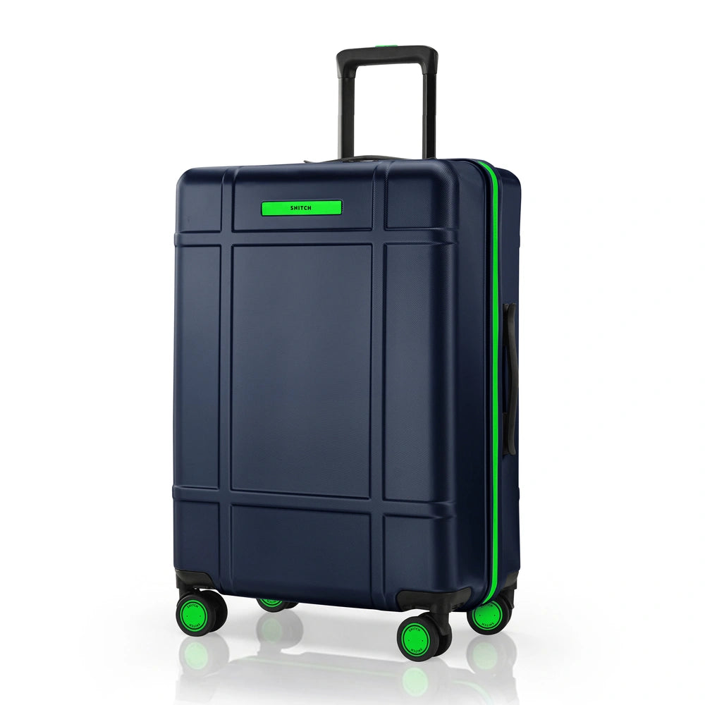 Large navy check-in trolley with upright handle, green accents, and 8 caster wheels