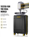 Black polycarbonate check-in trolley front view with top handle and yellow wheel accents