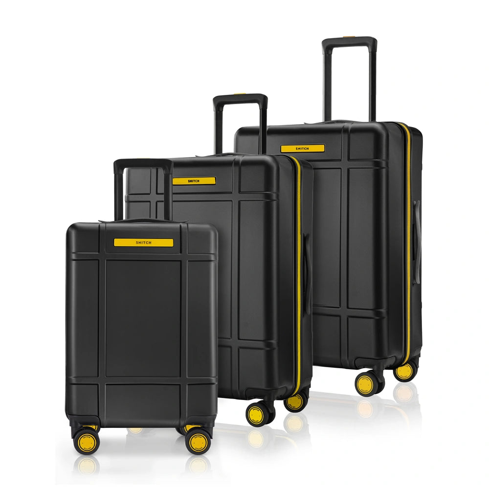 Set of three black polycarbonate trolley suitcases with 8 spinner wheels