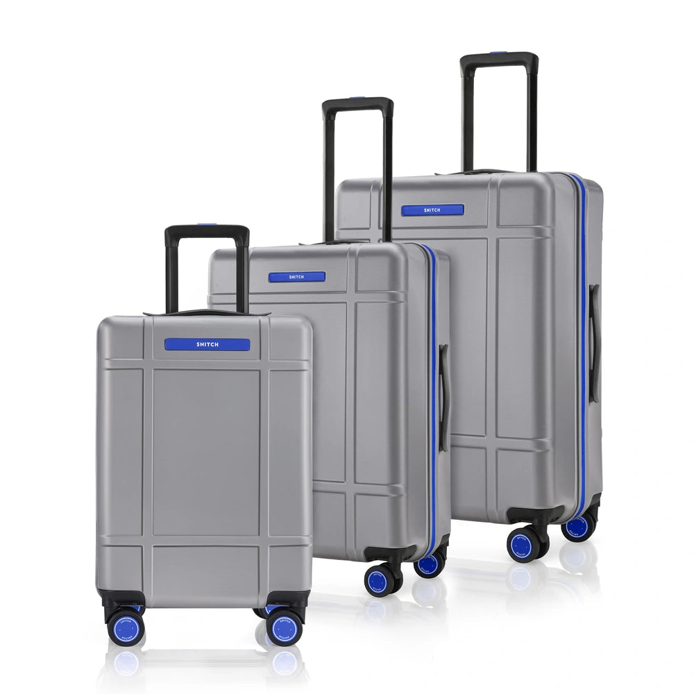 Silver polycarbonate trolley suitcase set of 3 with upright handles and spinner wheels