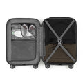 Small cabin suitcase open showing interior compartments and cross-strap on base