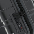 Small cabin suitcase side panel with combination lock dial near zipper
