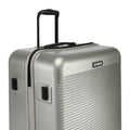 Silver hard-shell suitcase with side latch and telescopic handle