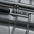 Silver suitcase handle with TSA-style combination lock panel