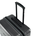 Medium check-in suitcase top view with telescopic handle and dark textured hard shell