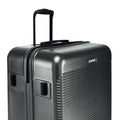 Black hard-shell luggage suitcase side view with ridged shell and recessed carry handle