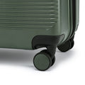 Dark green rolling suitcase close-up of caster wheel and lower side panel