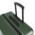 Green hard-shell suitcase top with grab handle and black zipper on the lid