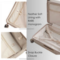 Beige hard-shell trolley interior with snap-buckle closure and monogram soft lining