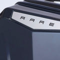 Hard shell polycarbonate luggage top corner with recessed logo panel and trim